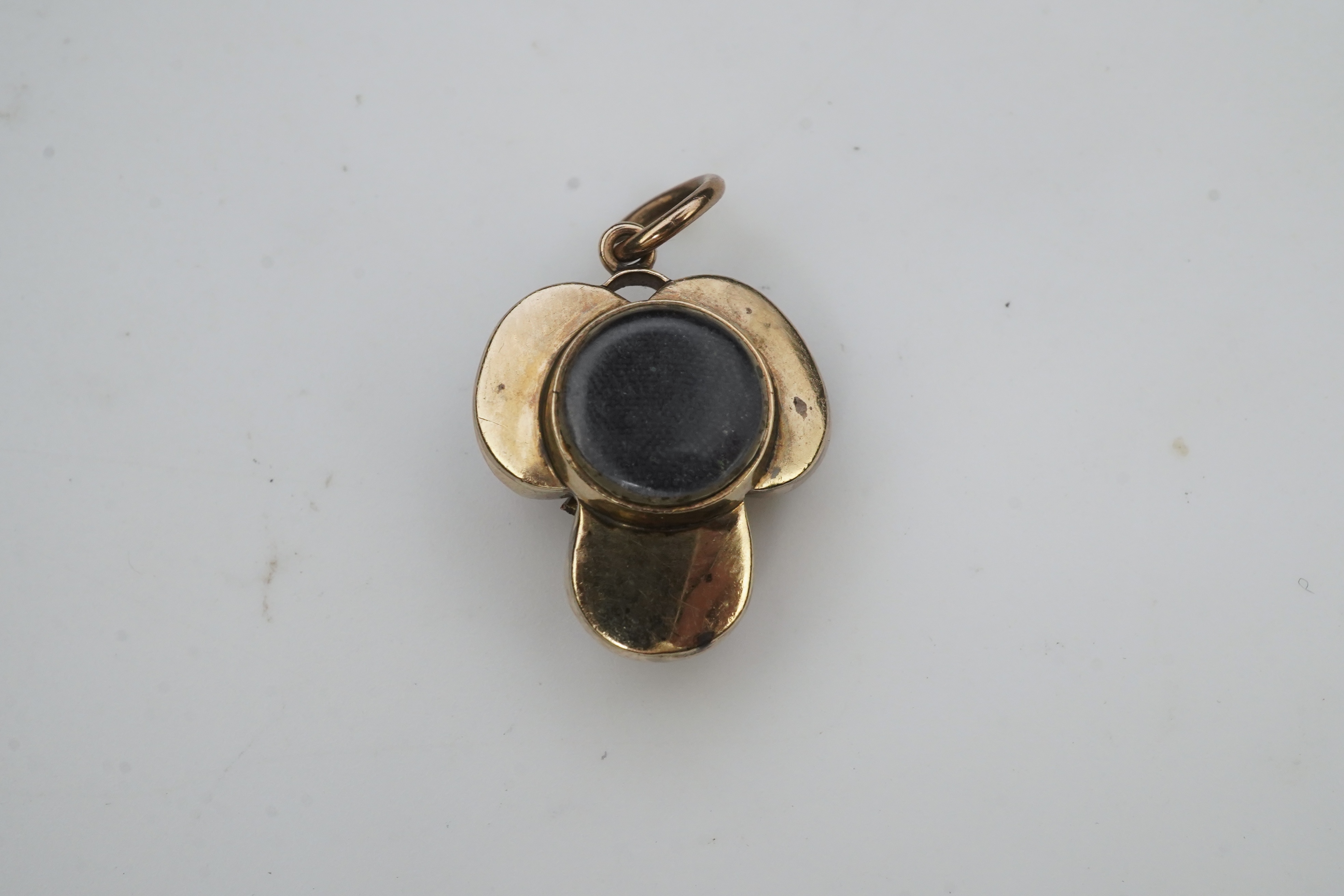 A Victorian garnet locket pendant, mid 19th century